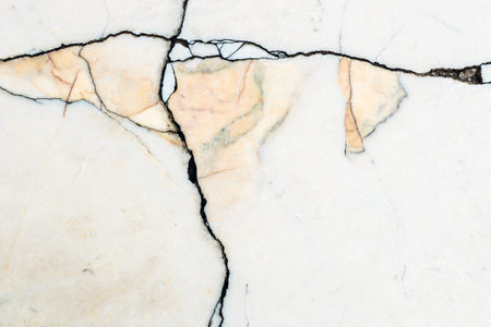 smooth marble wall texture with dark stripes and yellow stone inserts.
