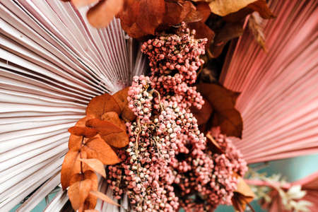 pink painted dried flowers in a stylish composition for decor.の写真素材