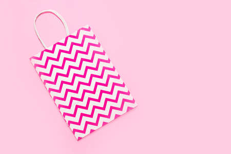 Wrapping paper pink bag for gifts and on fashionable background.の写真素材