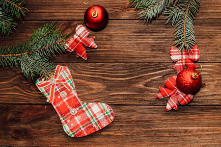 Christmas background with decorative sock on wooden planks.の写真素材