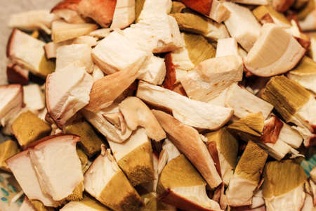 Chopped forest mushrooms Boletus edulis preparation for cooking.の写真素材