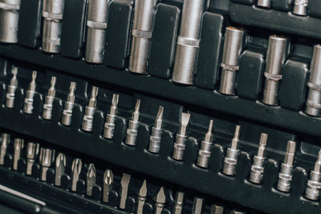 Tools wrench and nuts in a box for a motorist.