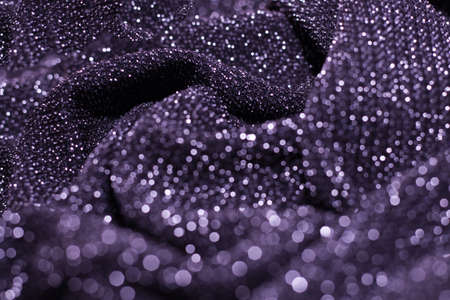 Texture of shiny sparkling lurex fabric purple lavender color.の写真素材