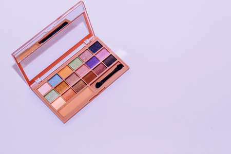 A palette of shimmery eyeshadows in different colors.の写真素材