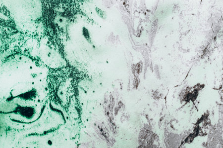 Fabric texture green with white natural silk marble print, tie-dye technique.の写真素材