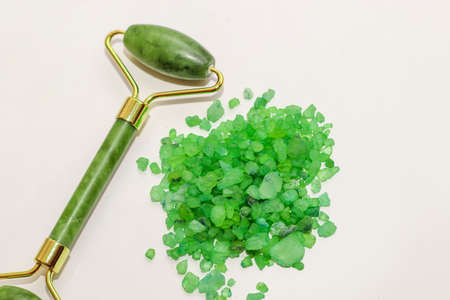 Facial massage jade roller and sea green aroma salt.の写真素材
