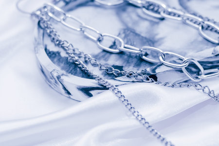 Gypsum marble decorative stand and silver decoration on the background of silk stand.