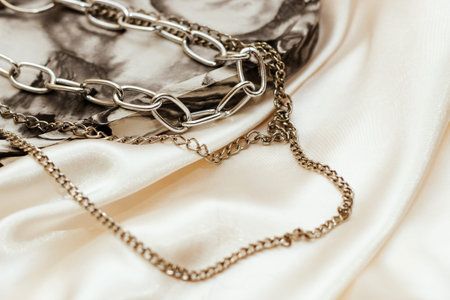 Gypsum marble decorative stand and silver decoration on the background of silk stand.の写真素材