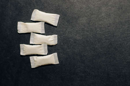 Nicotine snus spiders, tobacco pads, quit smoking concept.の写真素材