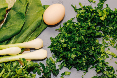 Young green chopped greens close-up, sour sorrel, eggs and onions.の写真素材