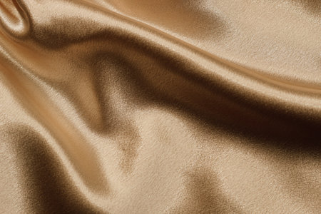 Gold silk fabric texture, Satin fashion Background for contentの写真素材