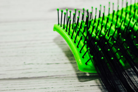 Alopecia hair loss concept, fallen hair on combs from disease.の写真素材