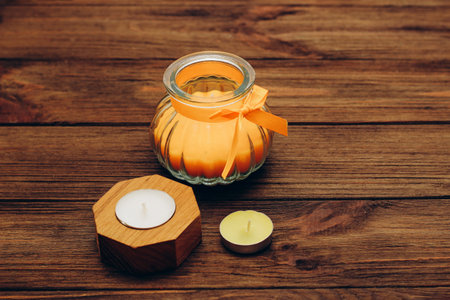 Multicolored candles, paraffin, wax and aromatic on a wooden table.の写真素材