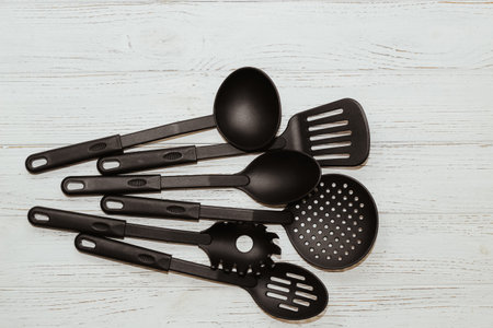 Kitchen tools plastic for multicooker on a wooden tableの写真素材