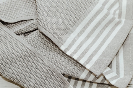 Kitchen modern textile towel on kitchen wooden table.の写真素材