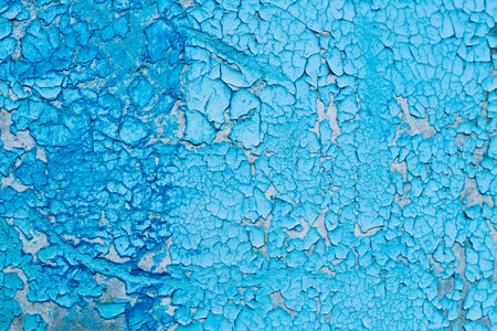 Blue texture of old cracked paint, grunge background.の写真素材