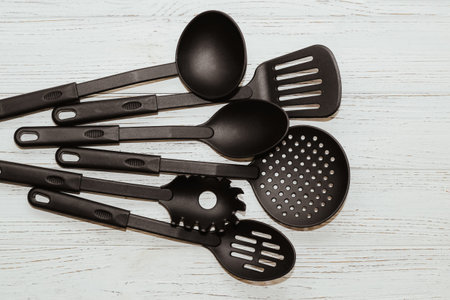 Kitchen tools plastic for multicooker on a wooden tableの写真素材