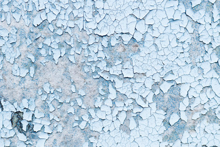 Blue texture of old cracked paint, grunge background.の写真素材