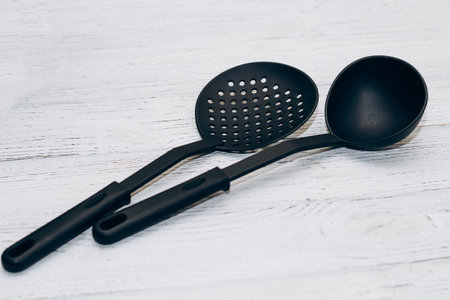 Kitchen tools plastic for multicooker on a wooden tableの写真素材