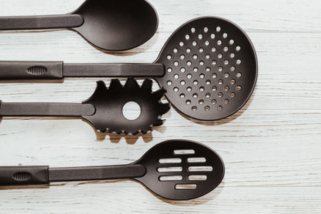 Kitchen tools plastic for multicooker on a wooden tableの写真素材