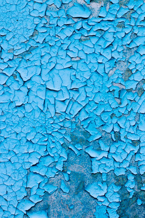 Blue texture of old cracked paint, grunge background.の写真素材