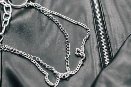 Chain on black texture eco soft leather, fashionable jacket.の写真素材