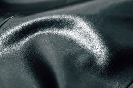 Black texture eco soft leather, fashionable jacket.の写真素材