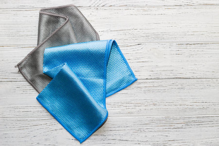 Blue and gray cloth with a special texture for cleaning glasses and dishes for household cleaning.の写真素材