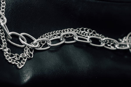 Chain on black texture eco soft leather, fashionable jacket.の写真素材