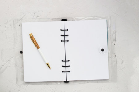 The pen lies in the notebook, the concept of study, time management.の写真素材