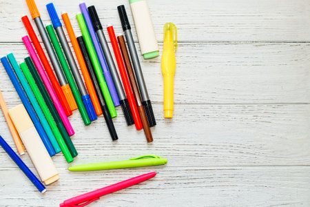 Stationery, colored felt-tip pens on a white table.の写真素材