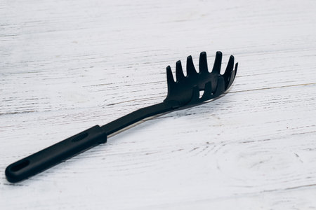 Kitchen tools plastic for multicooker on a wooden tableの写真素材