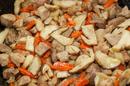 stewed vegetables, carrots with meat and mushrooms.の写真素材