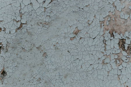 Gray texture of old cracked paint, grunge background.