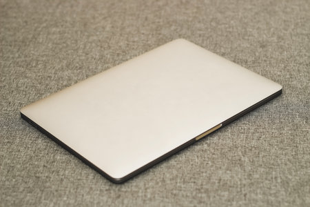 Laptop series flat metal on the table.の写真素材