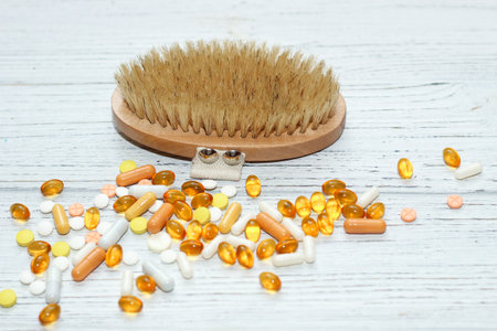 Massage wooden brush for dry massage against cellulite and vitamins.の写真素材