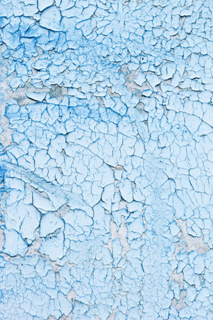 Blue texture of old cracked paint, grunge background.の写真素材