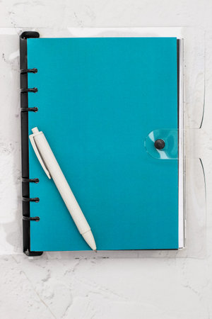 The pen lies in the notebook, the concept of study, time management.の写真素材