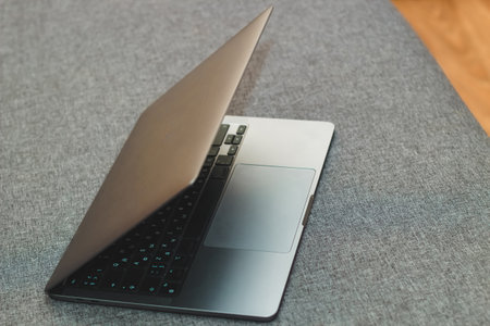 Laptop series flat metal on the table.の写真素材