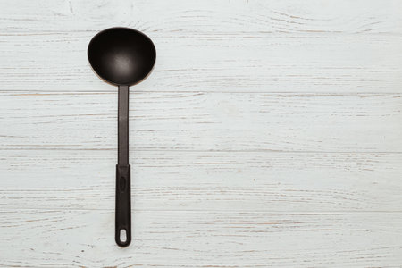 Kitchen tools plastic for multicooker on a wooden tableの写真素材