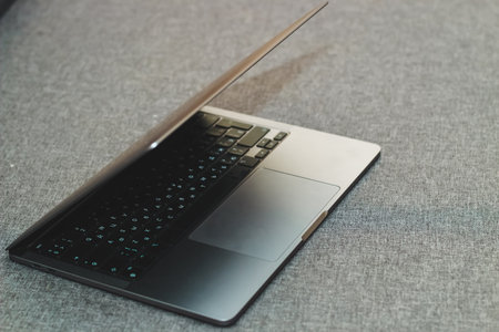 Laptop series flat metal on the table.の写真素材