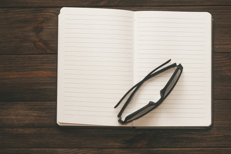 Notepad, diary, study concept, time management, with sunglasses.の写真素材