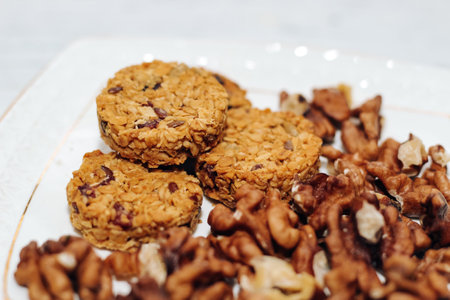 Healthy breakfast oat granola with nuts on a plate.の写真素材