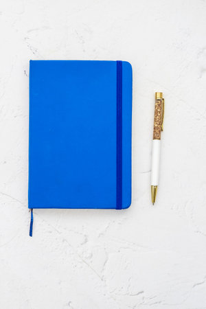 The pen lies in the notebook, the concept of study, time management.の写真素材