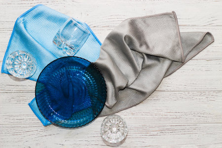 a rag with a special texture for cleaning glass glasses and dishes for home use.の写真素材
