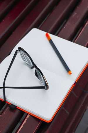 Glasses for vision on a notepad with a marker, study concept.の写真素材