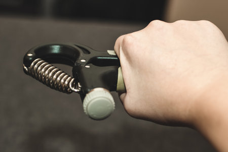 Wrist expander, black hand and finger massager.の写真素材