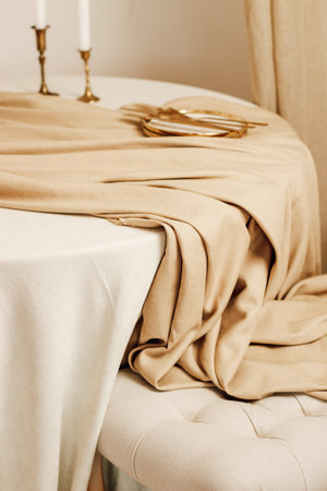 Stylish romantic table setting in the interior with fabricsの写真素材