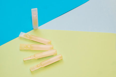 Probiotics medicine in vial on blue background.の写真素材