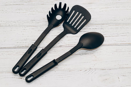 Kitchen tools plastic for multicooker on a wooden tableの写真素材